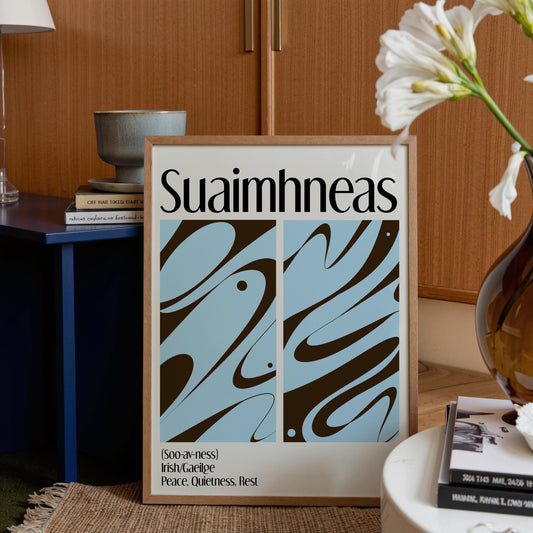 Framed artwork with abstract design and text 'Suaimhneas' in a home setting.